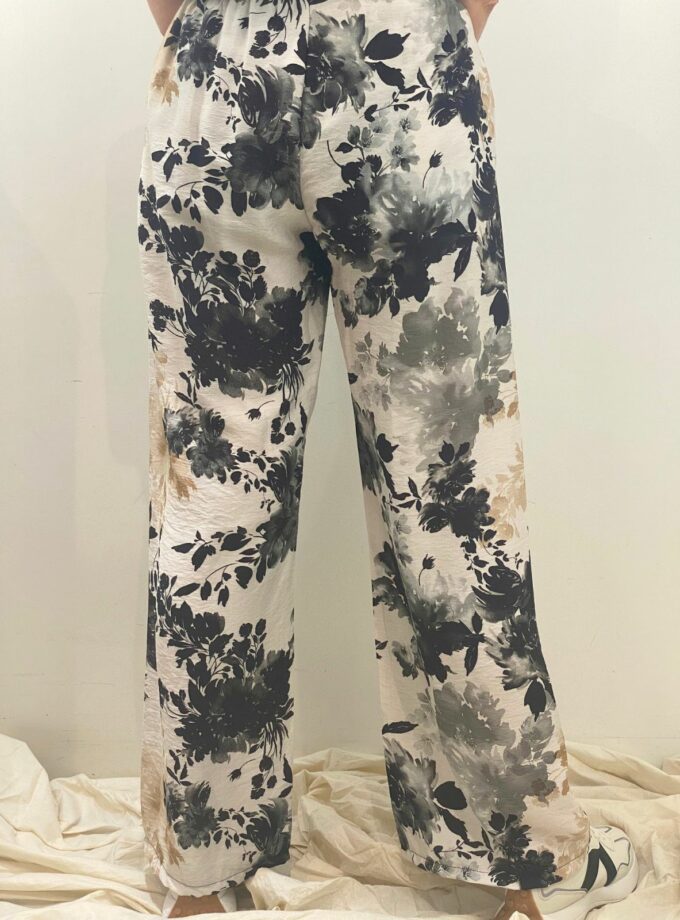 Pantalón estampado hojas negro