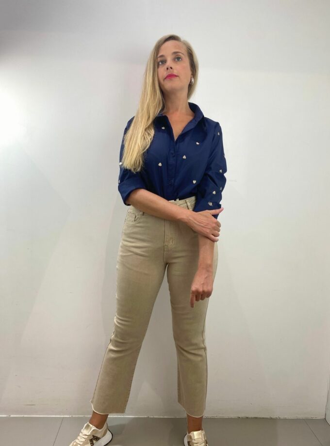 Pantalón vaquero beige flare