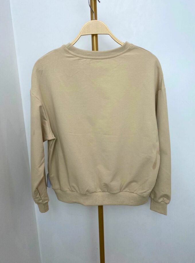 Sudadera corazón beige